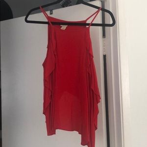 Flouncy tank with semi open back.